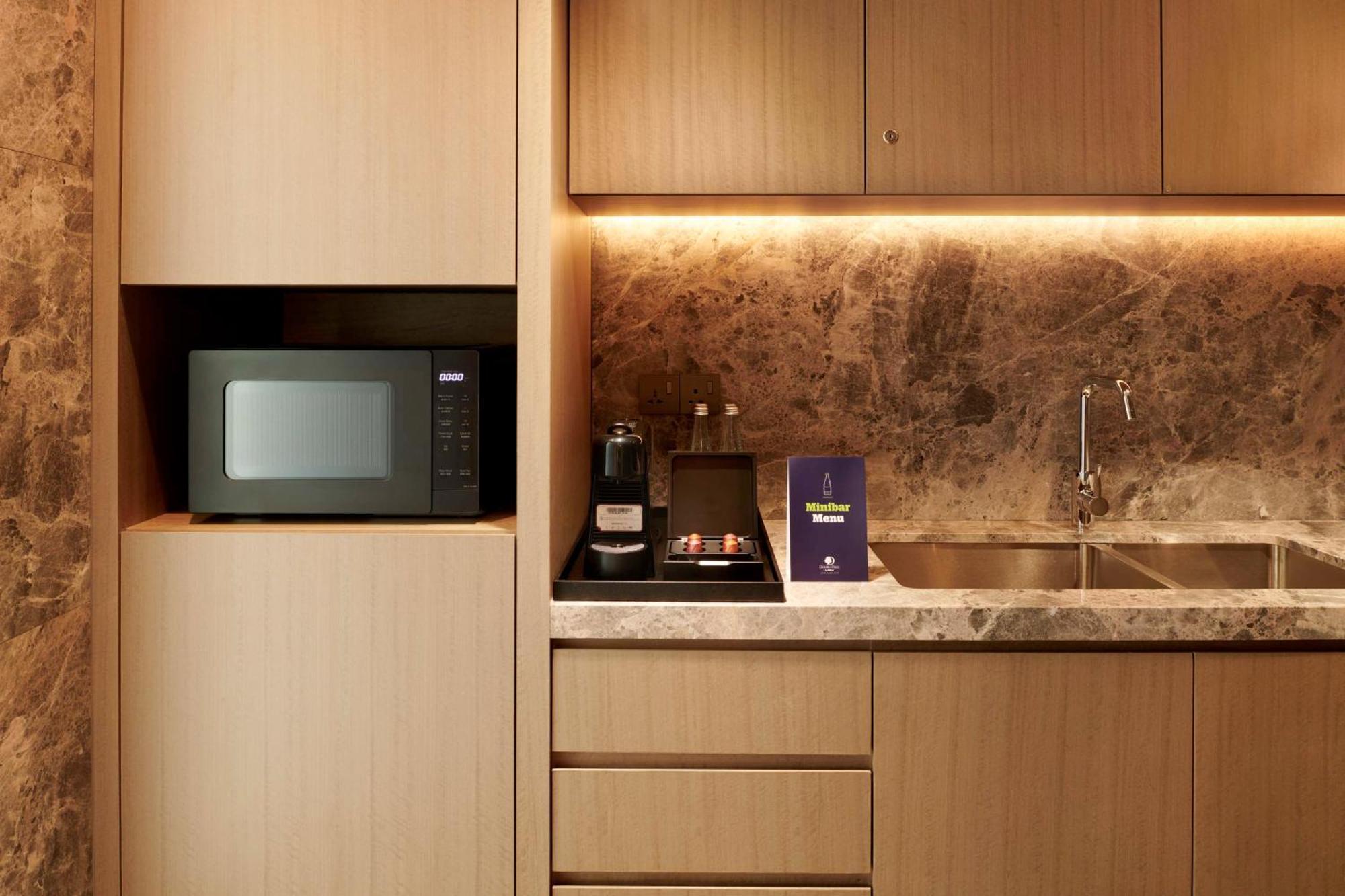 Doubletree By Hilton Shah Alam I-City Экстерьер фото A microwave oven in a kitchen